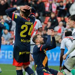 El Girona se parte por la mitad