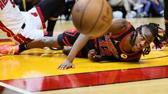 Apr 19, 2024; Miami, Florida, USA; Chicago Bulls guard Ayo Dosunmu (12) looks on after driving to the basket against Miami Heat forward Nikola Jovic (5) in the second quarter during a play-in game of the 2024 NBA playoffs at Kaseya Center. Mandatory Credit: Sam Navarro-USA TODAY Sports