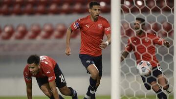 Argentina&#039;s Independiente Sergio Barreto (L) Juan Insaurralde and Adrian Arregui celebrate after Brazil&#039;s Bahia Thonny Anderson (out of frame) scored an own goal during the Copa Sudamericana football tournament group stage match at the Libertado