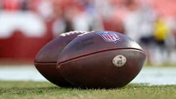 Aug 25, 2024; Landover, Maryland, USA; A detailed view of New England Patriots footballs on the field before the game against the Washington Commanders at Commanders Field. Mandatory Credit: Tommy Gilligan-USA TODAY Sports