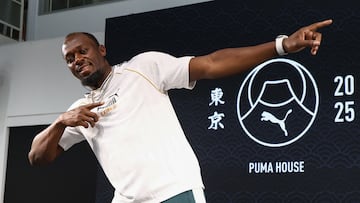 Legendary sprinter Jamaica�s Usain Bolt poses for photos following a press conference in Tokyo on September 11, 2025 ahead of the start of the World Athletics Championships. (Photo by JIJI PRESS / AFP) / Japan OUT