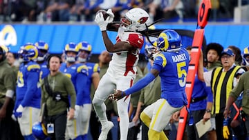 INGLEWOOD, CALIFORNIA - NOVEMBER 13: DeAndre Hopkins #10 of the Arizona Cardinals catches a pass against Jalen Ramsey #5 of the Los Angeles Rams in the third quarter of the game at SoFi Stadium on November 13, 2022 in Inglewood, California.   Sean M. Haffey/Getty Images/AFP