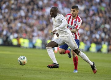 Mendy in actions against Correa.