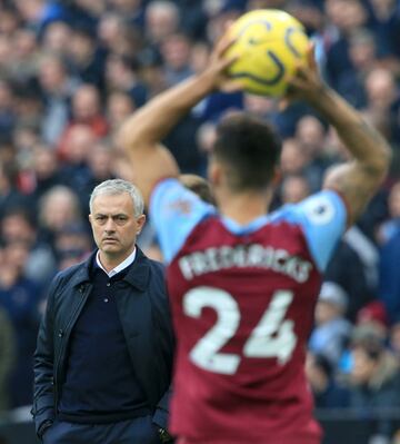 LONDON, ENGLAND - NOVEMBER 23: Jose Mourinho, Manager of Tottenham Hotspur looks on as Ryan Fredericks of West Ham United takes a throw in during the Premier League match between West Ham United and Tottenham Hotspur at London Stadium on November 23, 2019 in London, United Kingdom. (Photo by Stephen Pond/Getty Images)