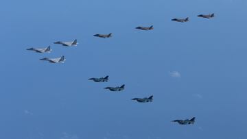 5th and 8th Air Wing of Japan Air Self-Defense Force's F-15 and F-2 fighters hold a joint military drill with U.S. Marine Aircraft Group 12's F-35B fighters off Japan's southernmost main island of Kyushu, Japan, in this handout picture taken by Japan Air Self-Defence Force and released by the Joint Staff Office of the Defense Ministry of Japan October 4, 2022. Joint Staff Office of the Defense Ministry of Japan/HANDOUT via REUTERS ATTENTION EDITORS - THIS IMAGE WAS PROVIDED BY A THIRD PARTY. MANDATORY CREDIT.