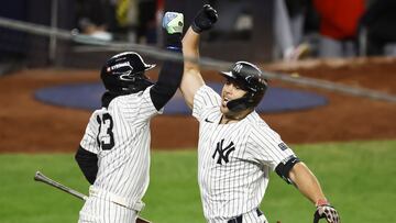 New York (United States), 14/10/2024.- Yankees Giancarlo Stanton (R) celebrates hitting a home run with teammate Jazz Chisholm Jr. (L) during the seventh inning of game one of the Major League Baseball (MLB) American League Championship Series between the Cleveland Guardians and the New York Yankees in the Bronx borough of New York, New York, 14 October 2024. The League Championship Series is the best-of-seven games. The winner of the American League Championship Series will face the winner of the National League Championship Series to advance to the World Series. (Liga de Campeones, Nueva York) EFE/EPA/CJ GUNTHER