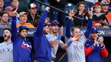 BALTIMORE, MARYLAND - OCTOBER 08: The Texas Rangers dugout celebrates a grand slam by Mitch Garver #18 (not pictured) against the Baltimore Orioles during the third inning in Game Two of the Division Series at Oriole Park at Camden Yards on October 08, 2023 in Baltimore, Maryland.   Patrick Smith/Getty Images/AFP (Photo by Patrick Smith / GETTY IMAGES NORTH AMERICA / Getty Images via AFP)