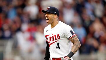 MINNEAPOLIS, MINNESOTA - OCTOBER 04: Carlos Correa #4 of the Minnesota Twins celebrates after tagging out Vladimir Guerrero Jr. #27 of the Toronto Blue Jays at second base during the fifth inning in Game Two of the Wild Card Series at Target Field on October 04, 2023 in Minneapolis, Minnesota.   David Berding/Getty Images/AFP (Photo by David Berding / GETTY IMAGES NORTH AMERICA / Getty Images via AFP)