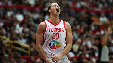 SAITAMA, JAPAN - AUGUST 25: Michael Roll #20 of Tunisia celebrates the victory during the International Basketball Games, Tokyo 2020 Olympic Games test event between Japan and Tunisia at Saitama Super Arena on August 25, 2019 in Saitama, Japan. (Photo by 