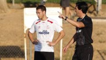 Cristóforo, junto a Emery.