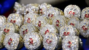 Counterfeit NFL merchandise seized by US Customs and Border Protection (CBP), including fake NFL Super Bowl Tampa Bay Buccaneers rings, is displayed during a press conference ahead of the Super Bowl at the Air Freight Federal Inspection Facility near Los