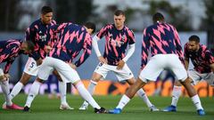 Raphael Varane and Toni Kroos and Dani Carvajal warming up prior to the first leg, 