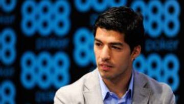 FILE - JULY 11, 2014: Liverpool and Barcelona agree deal for striker Luis Suarez on July 11, 2014. BARCELONA, SPAIN - MAY 14: Luis Suarez of Liverpool faces the media during the presentation as new Ambassador for 888poker on May 14, 2014 in Barcelona, Spain. (Photo by David Ramos/Getty Images)