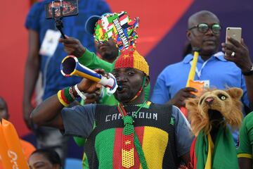 Cameroon fans cheer for their team prior to the 2019 Africa Cup of Nations (CAN) Group F football match between Benin and Cameroon at the Ismailia Stadium in the north-eastern Egyptian city on July 2, 2019. 