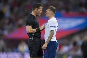 Ref Danny Makkelie has a word with Kieran Trippier.