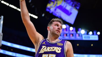 Nov 5, 2025; Los Angeles, California, USA; Los Angeles Lakers guard Luka Doncic (77) reacts after scoring the basket and drawing the foul against the San Antonio Spurs during the first half at Crypto.com Arena. Mandatory Credit: Gary A. Vasquez-Imagn Images