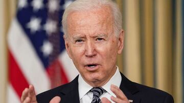 FILE PHOTO: U.S. President Joe Biden delivers remarks on the implementation of the American Rescue Plan in the State Dining Room at the White House in Washington, U.S., March 15, 2021. REUTERS/Kevin Lamarque/File Photo