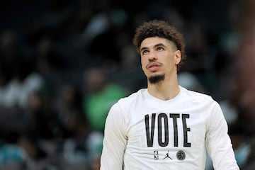 LaMelo Ball #1 of the Charlotte Hornets wears a "Vote" shirt as he warms up before the game against the Boston Celtics.