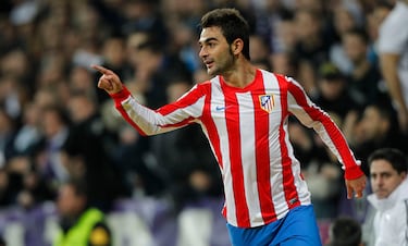 Militó en las filas del Atleti entre 2011 y 2014. Jugó 142 encuentros y anotó 26 goles. Sumó a su palmarés una Liga, una Supercopa de Europa, una Europa League y una Copa del Rey. 