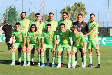 Cristian, el primero agachado por la izquierda, en este once del Málaga ante el Almería.