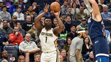 Mar 8, 2020; Minneapolis, Minnesota, USA; New Orleans Pelicans forward Zion Williamson (1) shoots the ball as Minnesota Timberwolves guard Jaylen Nowell (4) defends during the second quarter at Target Center. Mandatory Credit: Jeffrey Becker-USA TODAY Sports