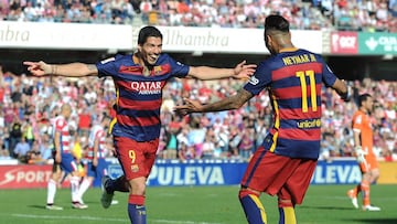 Luis Suarez celebrates his hat trick with Neymar. 