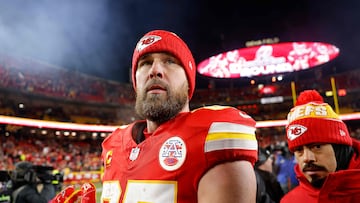 KANSAS CITY, MISSOURI - JANUARY 18: Travis Kelce #87 of the Kansas City Chiefs looks on after defeating the Houston Texans in the AFC Divisional Playoff at GEHA Field at Arrowhead Stadium on January 18, 2025 in Kansas City, Missouri. David Eulitt/Getty Images/AFP (Photo by David Eulitt / GETTY IMAGES NORTH AMERICA / Getty Images via AFP)