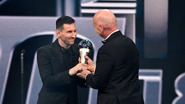 PARIS, FRANCE - FEBRUARY 27: Lionel Messi is congratulated by Gianni Infantino, President of FIFA after being presented with the Best FIFA Men's Payer 2022 award during The Best FIFA Football Awards 2022 on February 27, 2023 in Paris, France. (Photo by Aurelien Meunier/Getty Images)