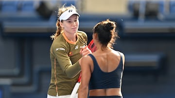 Kazakhstan's Elena Rybakina (L) shakes hands with Canada's Leylah Fernandez after her victory during their women's singles match at the Pan Pacific Open tennis tournament in Tokyo on October 23, 2025. (Photo by Kazuhiro NOGI / AFP)