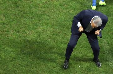 Brazil's head coach Tite celebrates Philippe Coutinho's opening goal.