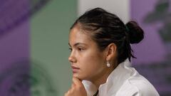 Britain's Emma Raducanu speaks to the media in the Main Interview Room following her defeat against France's Caroline Garcia in their women's singles tennis match on the third day of the 2022 Wimbledon Championships at The All England Tennis Club in Wimbledon, southwest London, on June 29, 2022. - RESTRICTED TO EDITORIAL USE (Photo by Joe TOTH / various sources / AFP) / RESTRICTED TO EDITORIAL USE (Photo by JOE TOTH/AFP via Getty Images)