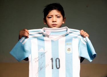 Afghan 'Messi boy' forced to flee home
