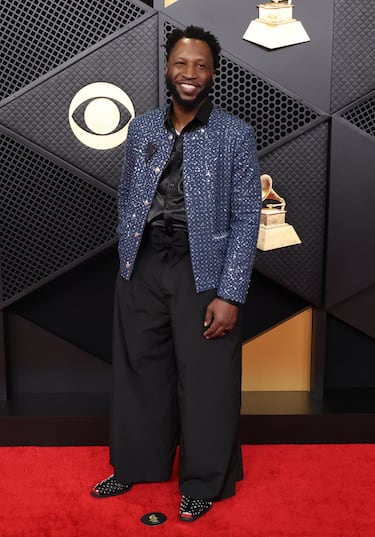 Gary G. Hamilton posa en la alfombra roja. 