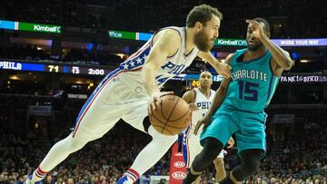 Jan 13, 2017; Philadelphia, PA, USA; Philadelphia 76ers guard Sergio Rodriguez (14) dribbles past Charlotte Hornets guard Kemba Walker (15) during the second half at Wells Fargo Center. The Philadelphia 76ers won 102-93. Mandatory Credit: Bill Streicher-USA TODAY Sports