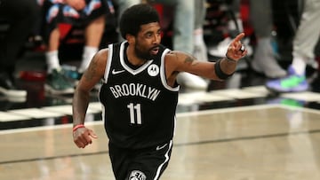 FILE PHOTO: Jun 5, 2021; Brooklyn, New York, USA; Brooklyn Nets point guard Kyrie Irving (11) reacts after making a basket against the Milwaukee Bucks during the second quarter of game one in the Eastern Conference semifinals of the 2021 NBA Playoffs at B