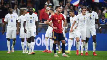 Spain's midfielder Ferran Torres (C) reacts after his team conceded the equalizer during the Nations League final football match between Spain and France at San Siro stadium in Milan, on October 10, 2021. (Photo by FRANCK FIFE / AFP)