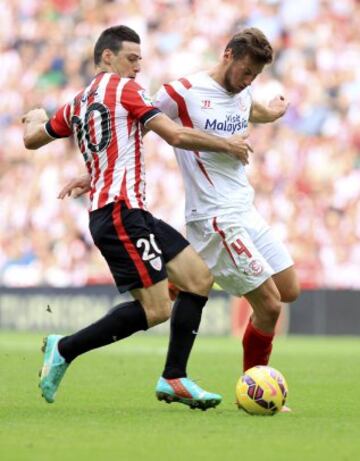 Aduriz con Krychowiak.