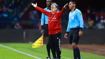 MEXICO CITY, MEXICO - MARCH 24: Gerardo Martino Coach of Mexico gestures during a match between Mexico and United States as part of Concacaf 2022 FIFA World Cup Qualifiers at Azteca Stadium on March 24, 2022 in Mexico City, Mexico. (Photo by Hector Vivas/Getty Images)