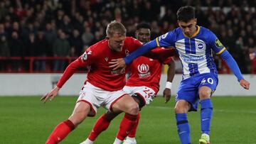 Nottingham Forest's English defender Joe Worrall (L) fights for the ball with Brighton's Argentinian midfielder Facundo Buonanotte during the English Premier League football match between Nottingham Forest and Brighton and Hove Albion at The City Ground in Nottingham, central England, on April 26, 2023. (Photo by Geoff Caddick / AFP) / RESTRICTED TO EDITORIAL USE. No use with unauthorized audio, video, data, fixture lists, club/league logos or 'live' services. Online in-match use limited to 120 images. An additional 40 images may be used in extra time. No video emulation. Social media in-match use limited to 120 images. An additional 40 images may be used in extra time. No use in betting publications, games or single club/league/player publications. / 