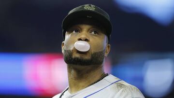 MIAMI, FLORIDA - MAY 18: Robinson Cano #24 of the New York Mets looks on during the game against the Miami Marlins at Marlins Park on May 18, 2019 in Miami, Florida.   Michael Reaves/Getty Images/AFP
 == FOR NEWSPAPERS, INTERNET, TELCOS &amp; TELEVISION USE ONLY ==