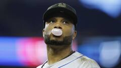 MIAMI, FLORIDA - MAY 18: Robinson Cano #24 of the New York Mets looks on during the game against the Miami Marlins at Marlins Park on May 18, 2019 in Miami, Florida.   Michael Reaves/Getty Images/AFP
 == FOR NEWSPAPERS, INTERNET, TELCOS &amp; TELEVISION USE ONLY ==