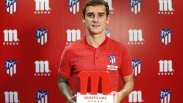 Griezmann con el trofeo.