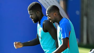 Umtiti, con Dembélé.