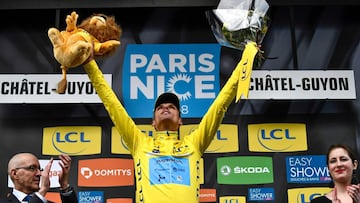 New overall leader Astana team Spanish rider Luis Leon Sanchez celebrates on the podium after the third stage of the Paris - Nice cycling race between Bourges and Chatel-Guyon on March 6, 2018 in Chatel-Guyon.  / AFP PHOTO / JEFF PACHOUD