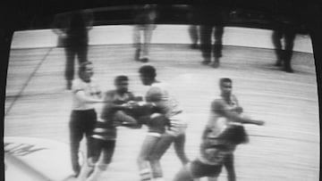 (Original Caption) December 12, 1977, New York: Los Angeles Lakers forward Kermit Washington was fined an NBA league-maximum $10,000 and suspended for at least 60 days by NBA Commissioner Lawrence O'Brien for punching Houston's Rudy Tomjanovich in this game at the Inglewood, California, Forum 12/9. Picture from NBC television tape shows Tomjanovich going down at right.