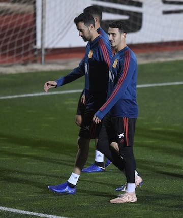 Mario Hermoso y Sergio Busquets.