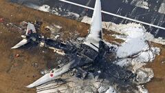An aerial view shows burnt Japan Airlines' (JAL) Airbus A350 plane after a collision with a Japan Coast Guard aircraft at Haneda International Airport in Tokyo, Japan January 3, 2024, in this photo taken by Kyodo. Mandatory credit Kyodo/via REUTERS   ATTENTION EDITORS - THIS IMAGE HAS BEEN SUPPLIED BY A THIRD PARTY. MANDATORY CREDIT. JAPAN OUT. NO COMMERCIAL OR EDITORIAL SALES IN JAPAN.