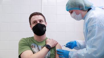 Oleh Tsarkov, a member of the Ukrainian Olympic shooting team that will compete in the Tokyo 2020 Olympics, receives a dose of Chinese-developed CoronaVac vaccine against the coronavirus disease (COVID-19) in Kyiv, Ukraine April 15, 2021. REUTERS/Valentyn Ogirenko