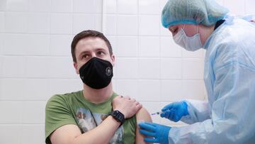 Oleh Tsarkov, a member of the Ukrainian Olympic shooting team that will compete in the Tokyo 2020 Olympics, receives a dose of Chinese-developed CoronaVac vaccine against the coronavirus disease (COVID-19) in Kyiv, Ukraine April 15, 2021. REUTERS/Valentyn