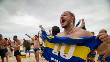 Fans of Argentina�s Boca Juniors enjoy Copacabana beach in Rio de Janeiro, Brazil, on November 2, 2023, ahead of the Copa Libertadoreas final match against Fluminense next November 4. (Photo by Carlos Fabal / AFP)